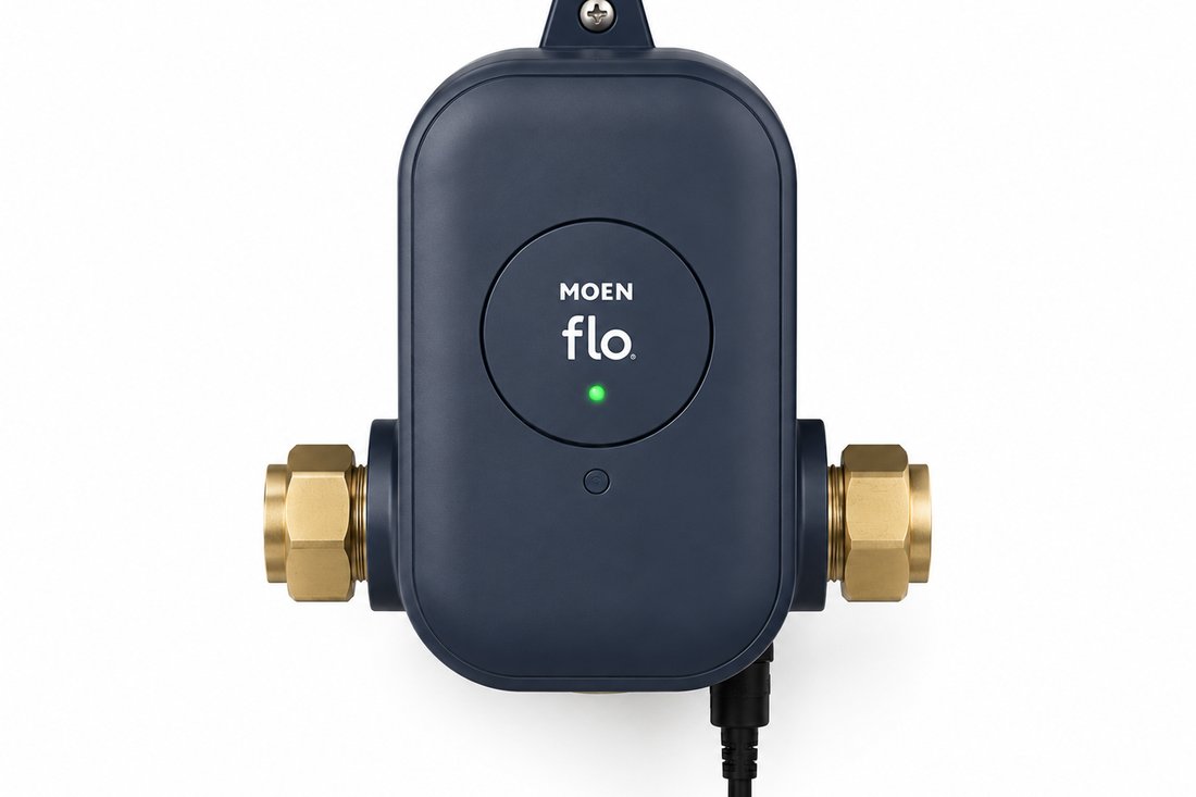 Moen Flo smart water monitor installed on a pipe